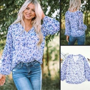 Fully lined, floral print top/balloon sleeve, lantern cuff/v-notch neckline